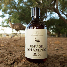 Load image into Gallery viewer, Emu oil shampoo with emu in background on farm
