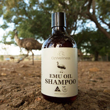 Load image into Gallery viewer, Emu oil shampoo with emu in background on farm